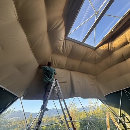 Internal canvas insulation being fitted to Isobel Geodome
