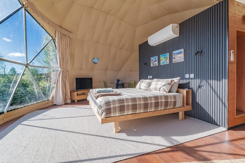 Isobel Geodome bedroom, tv and dining